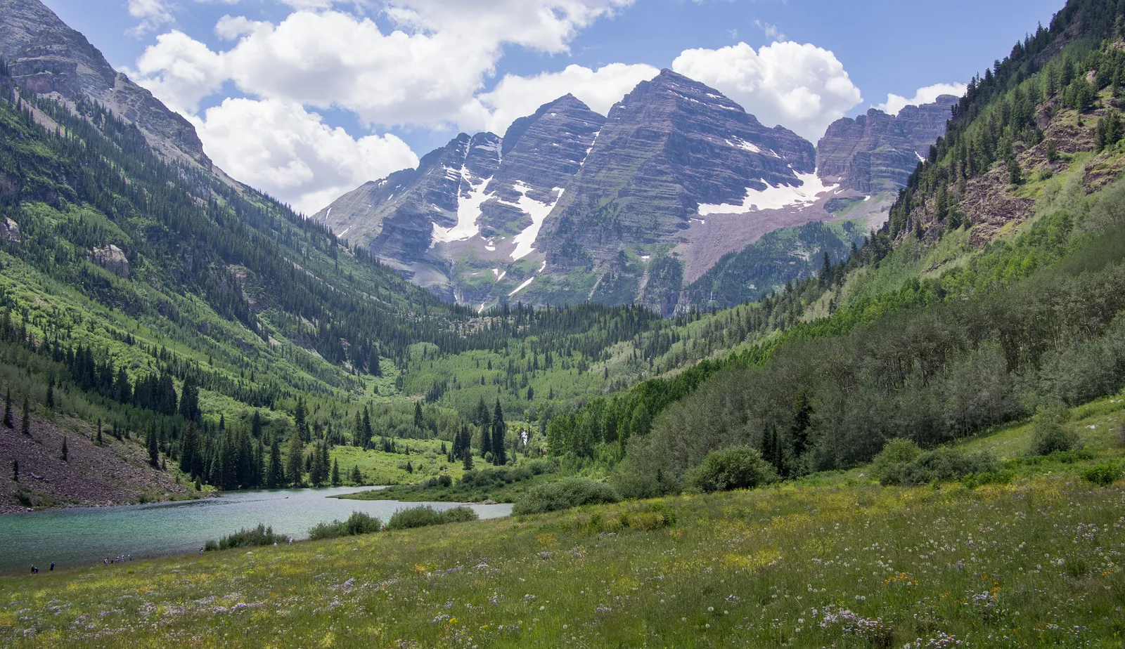 The Maroon Bells in Aspen, Colorado, with Maroon Lake in the foreground.