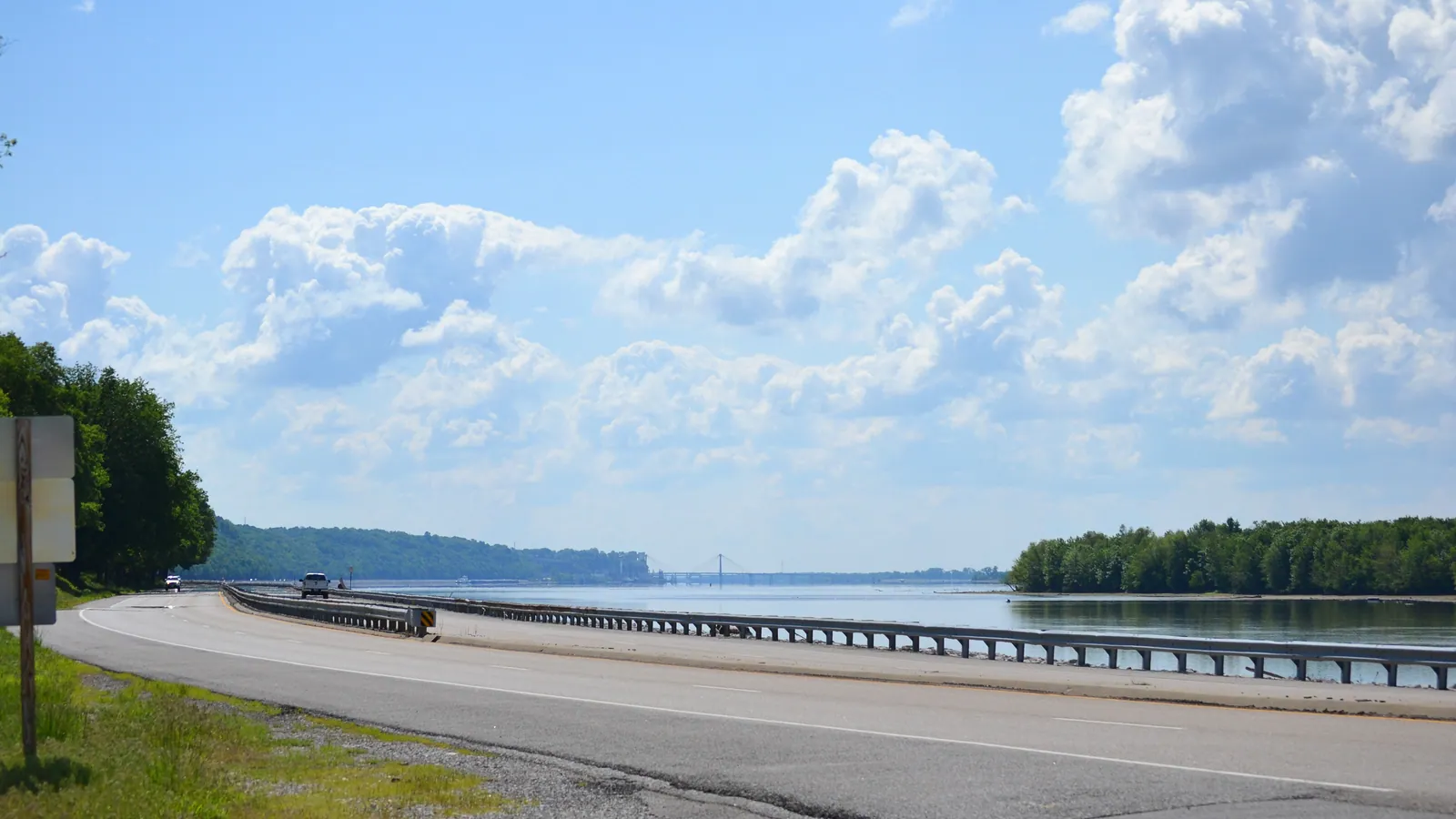 Illinois Route 100 below Godfrey, Illinois along the Mississippi River , part of the Meeting of the Great Rivers Scenic Route section of the Great River Road .